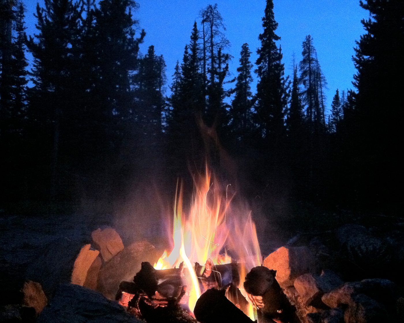 Campfire evening at camp